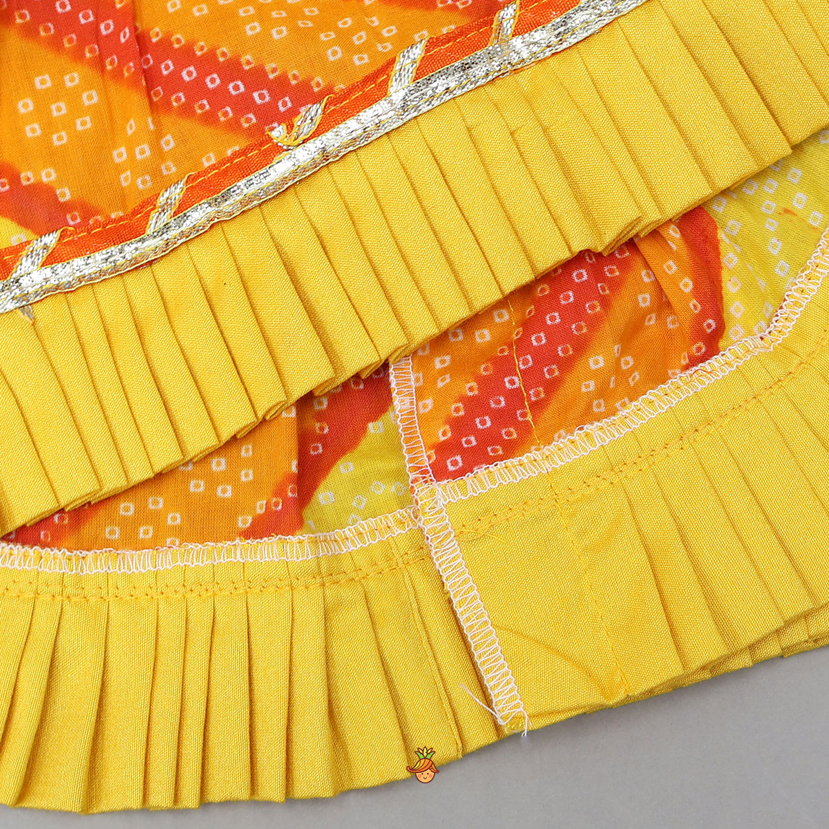 Bandhani Printed Angarkha-Style Kurti With Headband And Booties