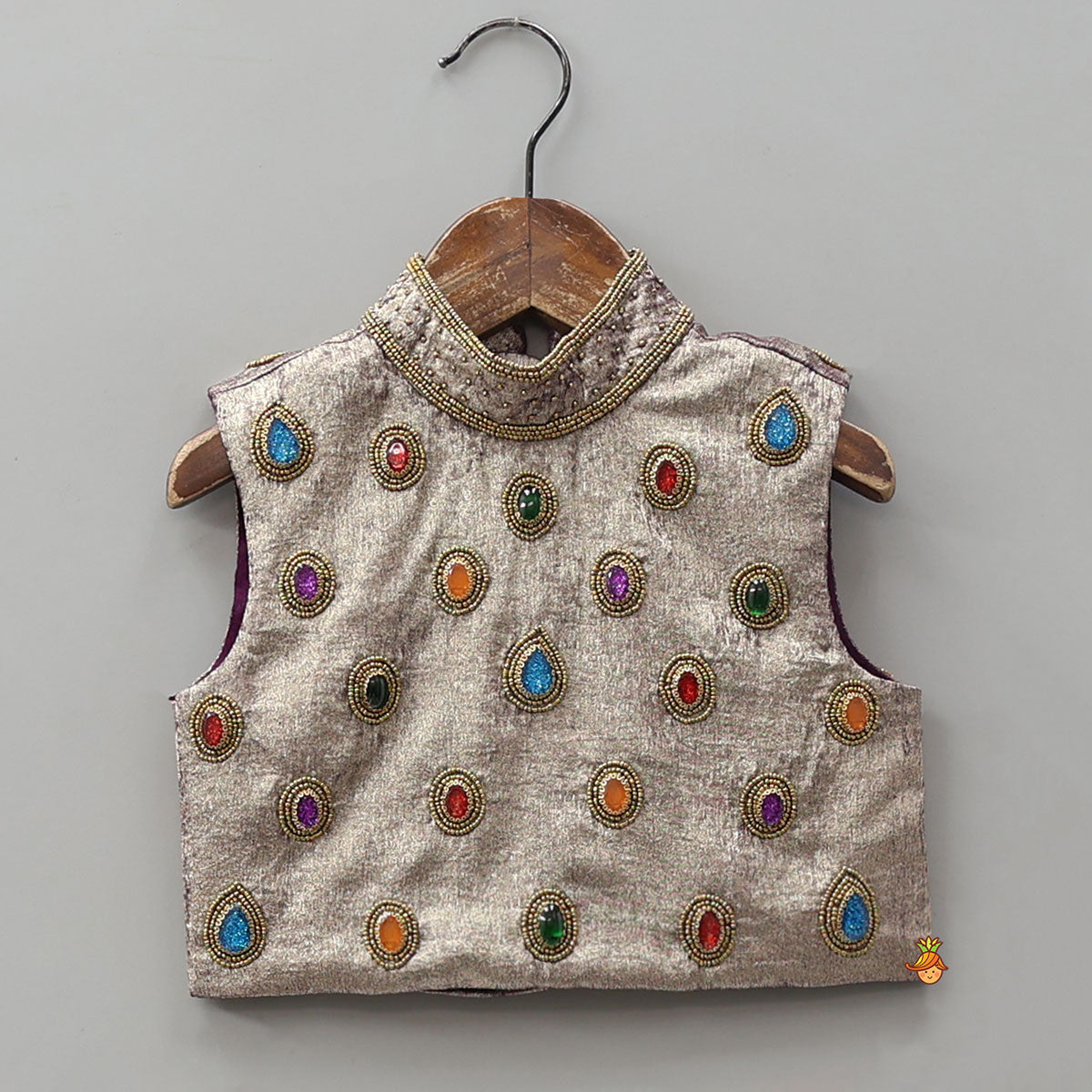 Sleeveless Shiny Top With Layered Lehenga And Attached Dupatta