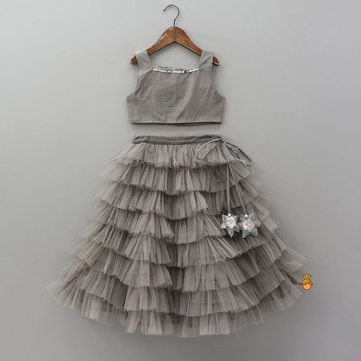 Beautiful Top With Open Jacket And Layered Net Lehenga