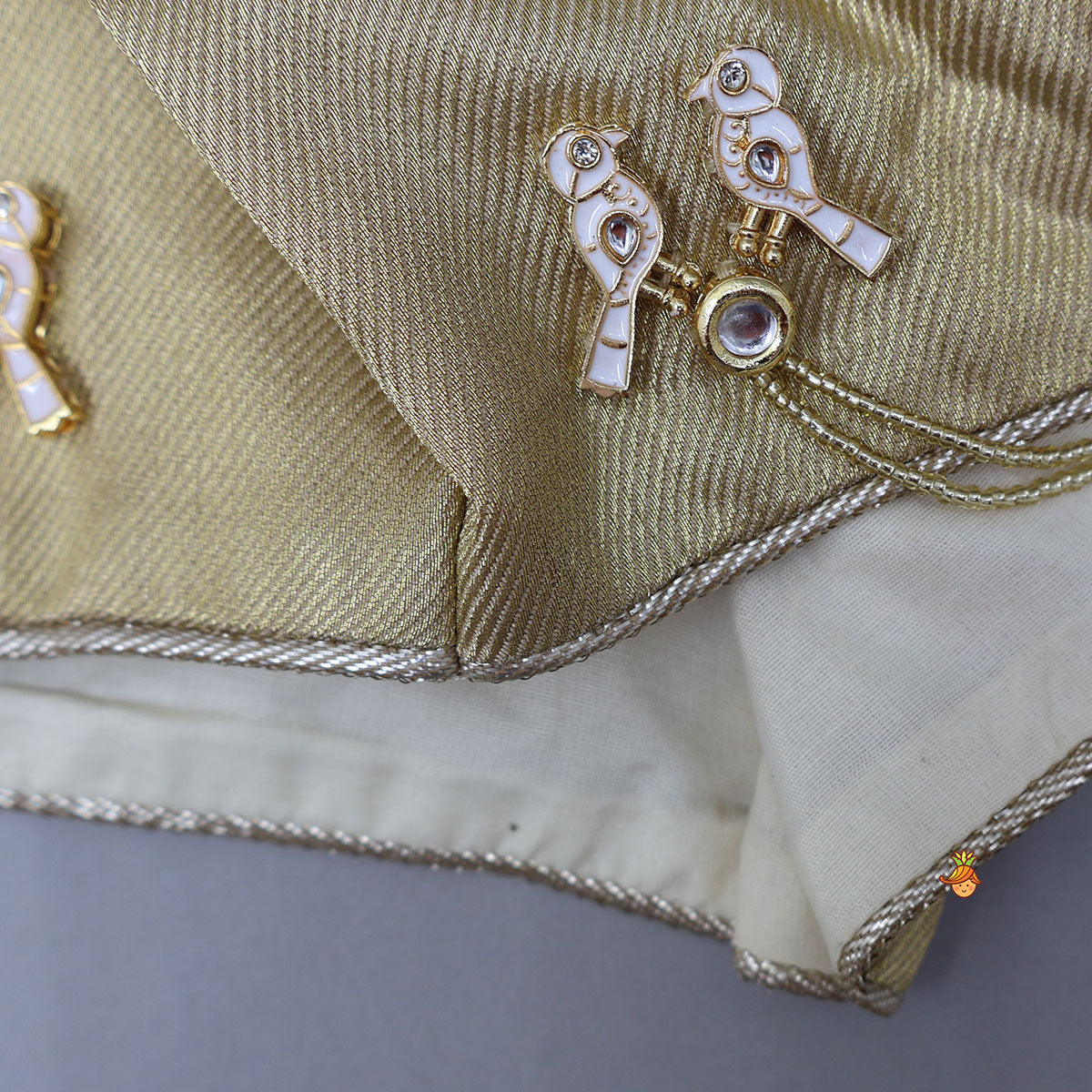 Exquisite Halter Neck Brocade Top With Embellished Jacket And Brocade Lehenga With Matching Hair Band