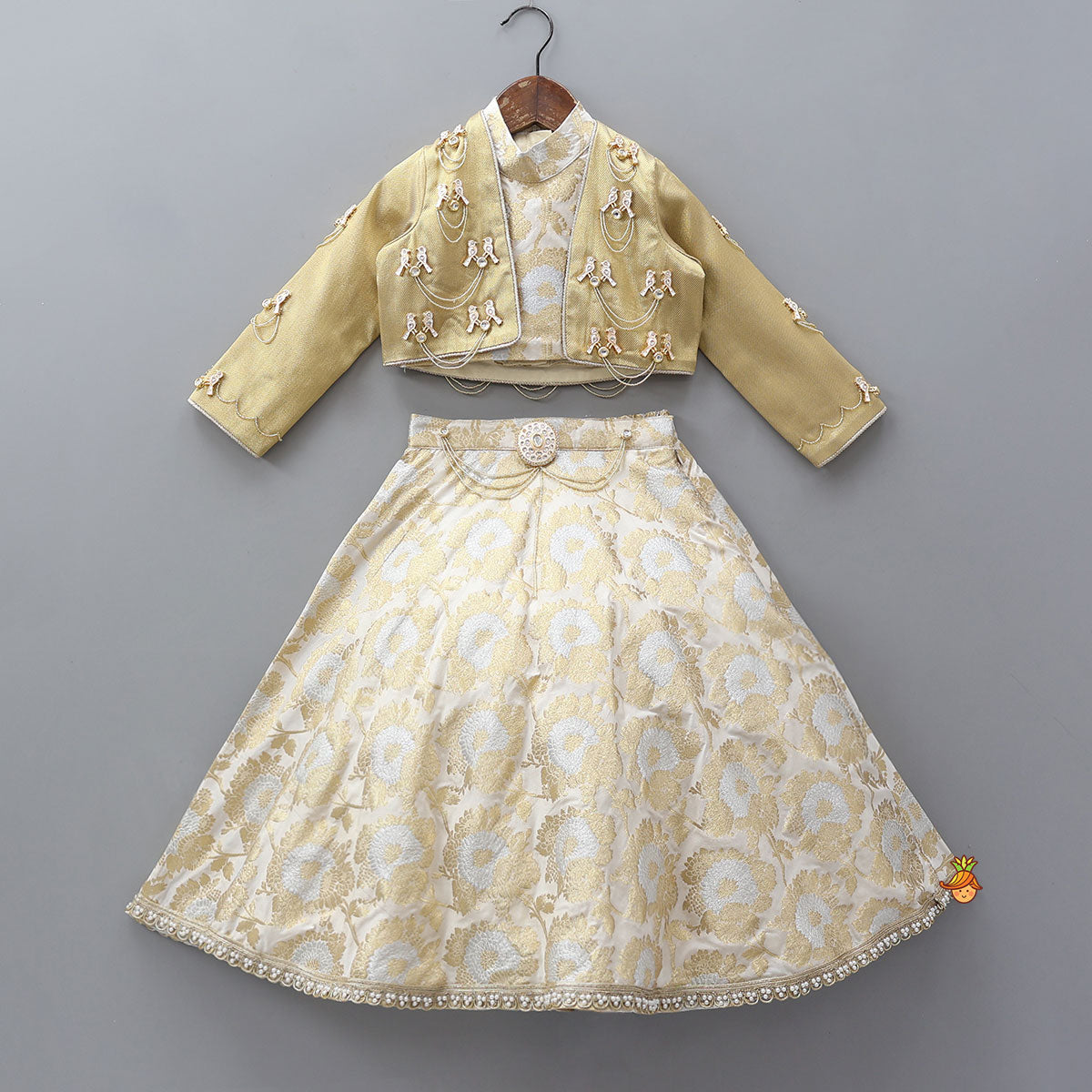 Exquisite Halter Neck Brocade Top With Embellished Jacket And Brocade Lehenga With Matching Hair Band