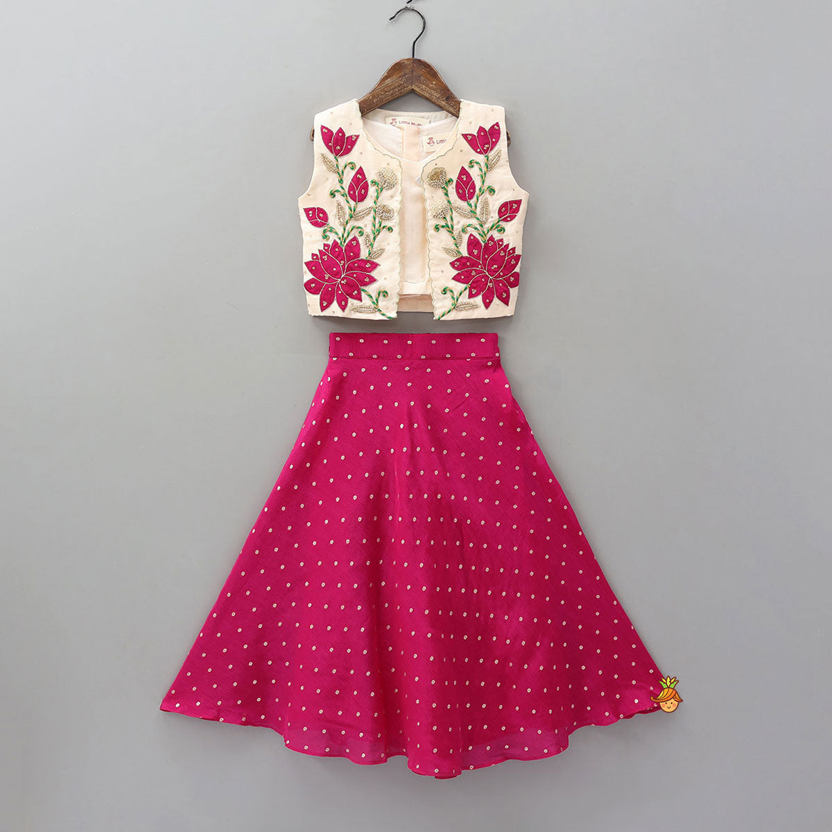 Sleeveless Top With Embroidered Jacket And Booti Work Lehenga