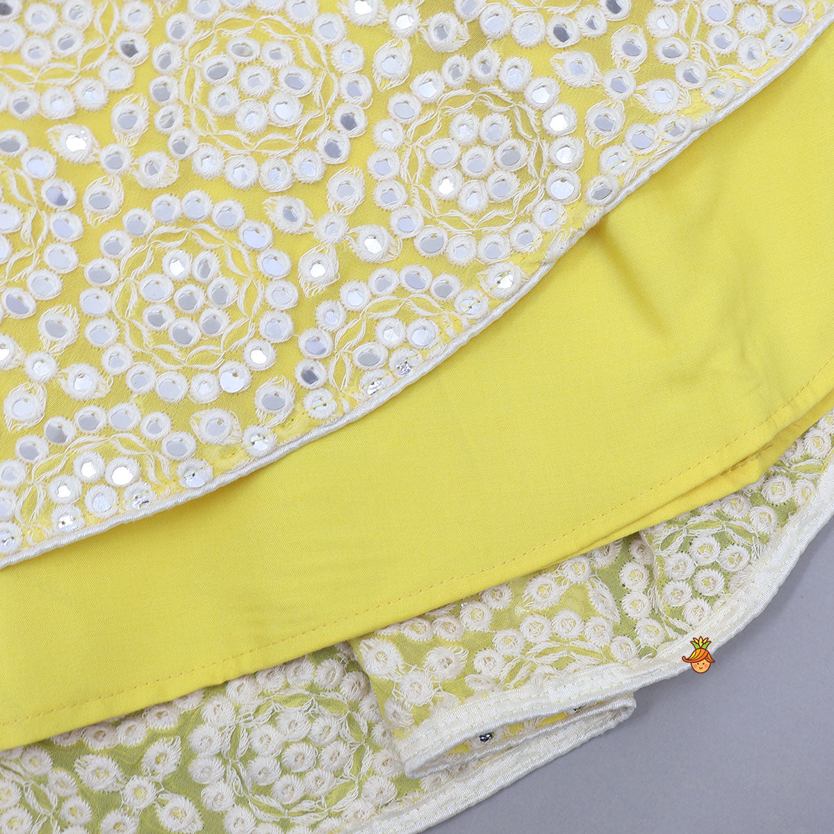 Heavy Faux Mirror Work Top And Lehenga With Matching Net Dupatta