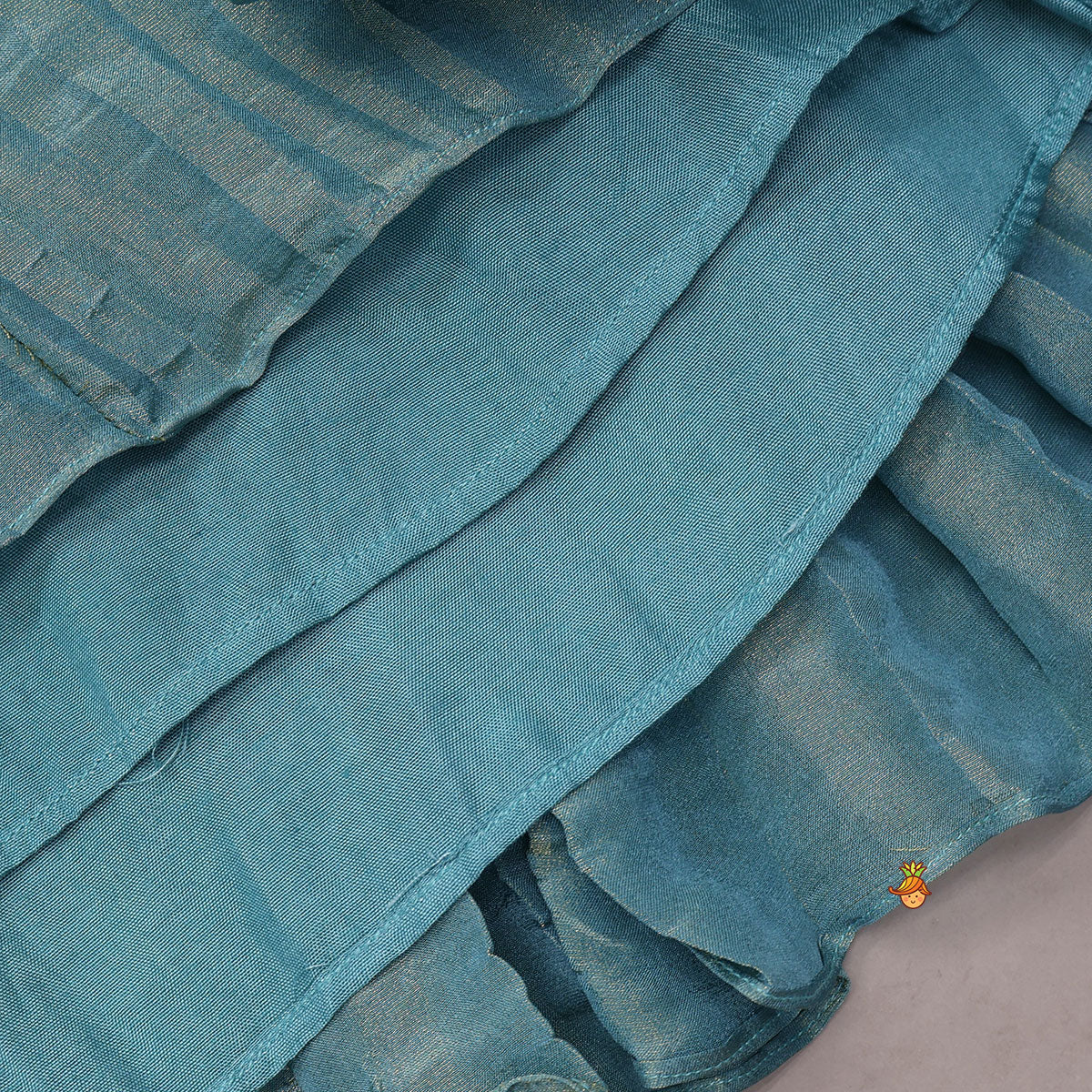 Heavy Embroidered High-Low Shimmery Top And Lehenga