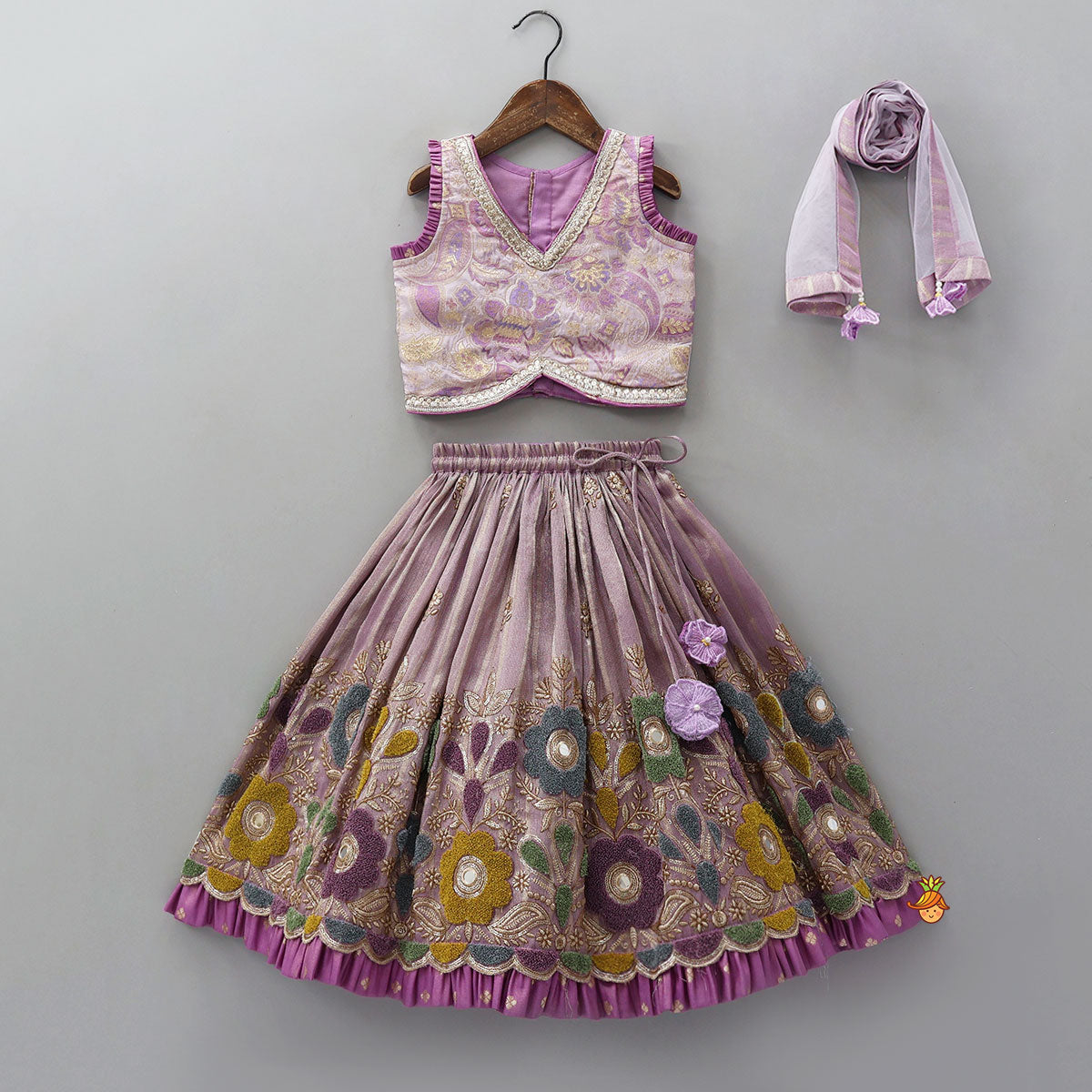 Pleated Armhole Top And Shimmery Lehenga With Matching Net Dupatta