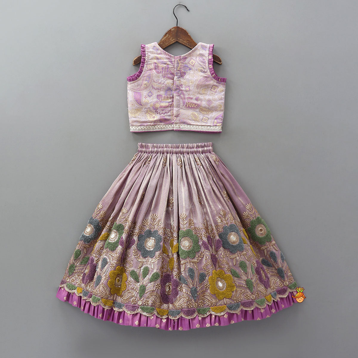 Pleated Armhole Top And Shimmery Lehenga With Matching Net Dupatta