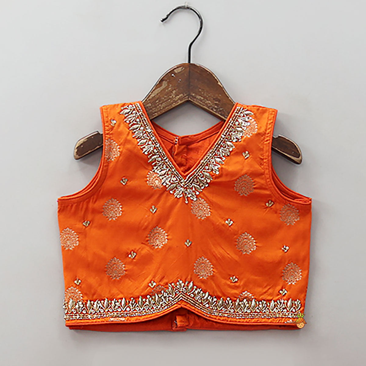 Embroidered Elegant Top And Brocade Lehenga With Matching Net Dupatta And Brocade Potli Bag