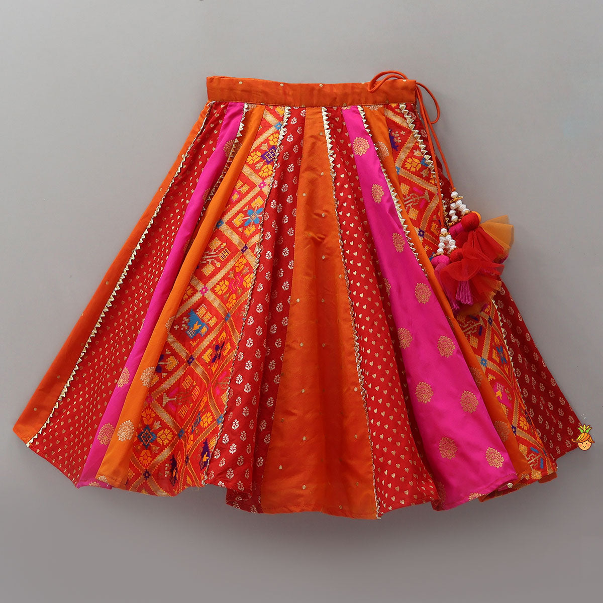 Embroidered Elegant Top And Brocade Lehenga With Matching Net Dupatta And Brocade Potli Bag