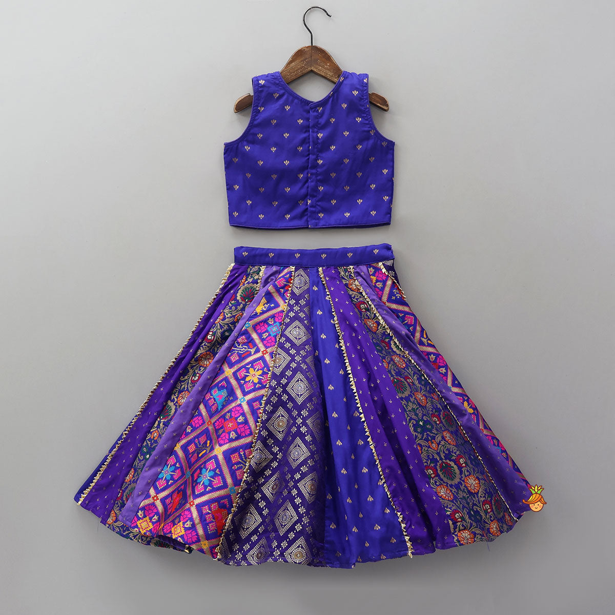 Gorgeous Embroidered Top And Brocade Lehenga With Matching Net Dupatta And Brocade Potli Bag