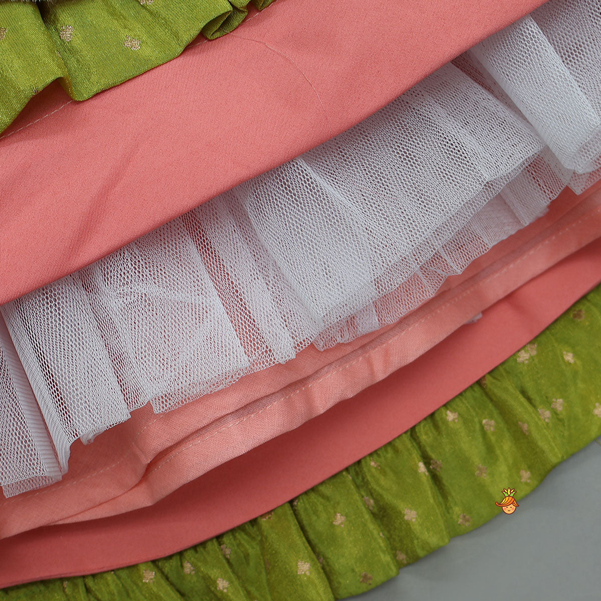 Pleated Armhole Elegant Top And Shimmery Lehenga With Matching Net Dupatta