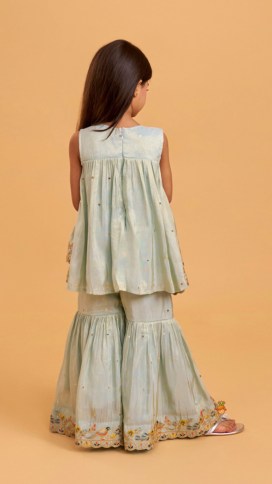 Layered Shimmery Kurti And Sharara With Contrasting Dupatta