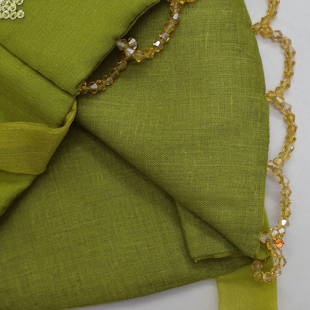 Organza Top And Lehenga With Handmade Tassel Detailing