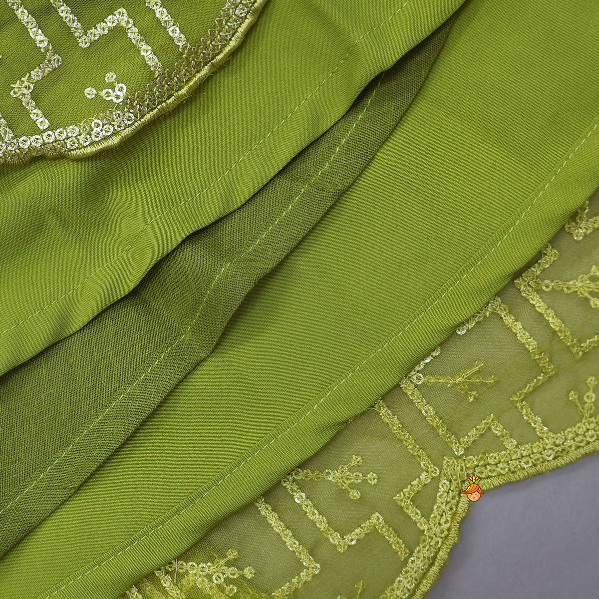 Organza Top And Lehenga With Handmade Tassel Detailing