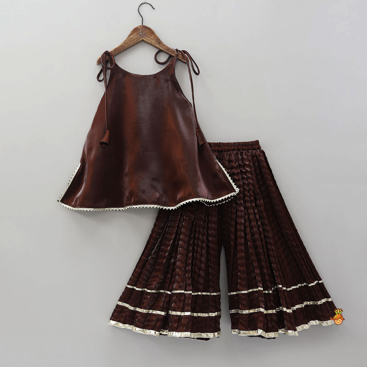 Sleeveless Sheen Kurti And Crushed Fabric Palazzo With Hair Tie