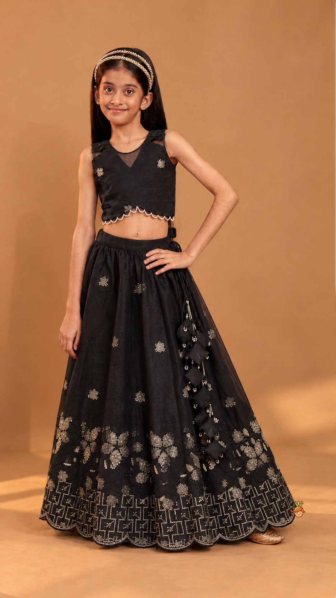 Exquisite Organza Top And Lehenga With Tassel Detailing