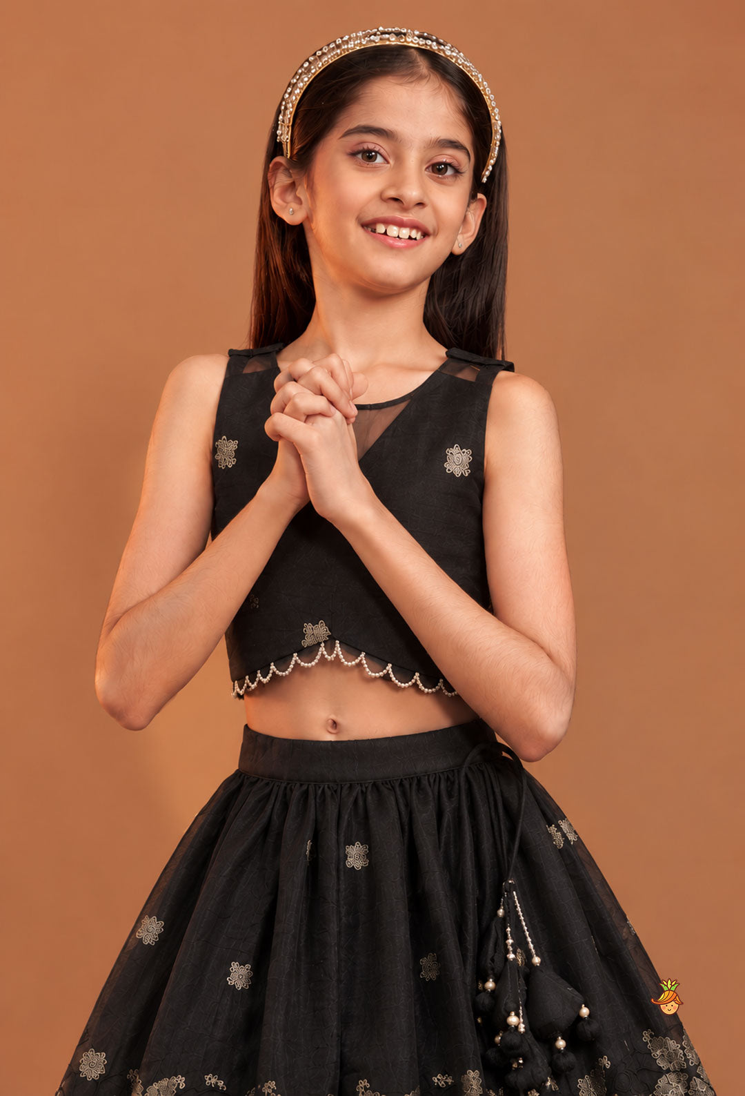 Exquisite Organza Top And Lehenga With Tassel Detailing