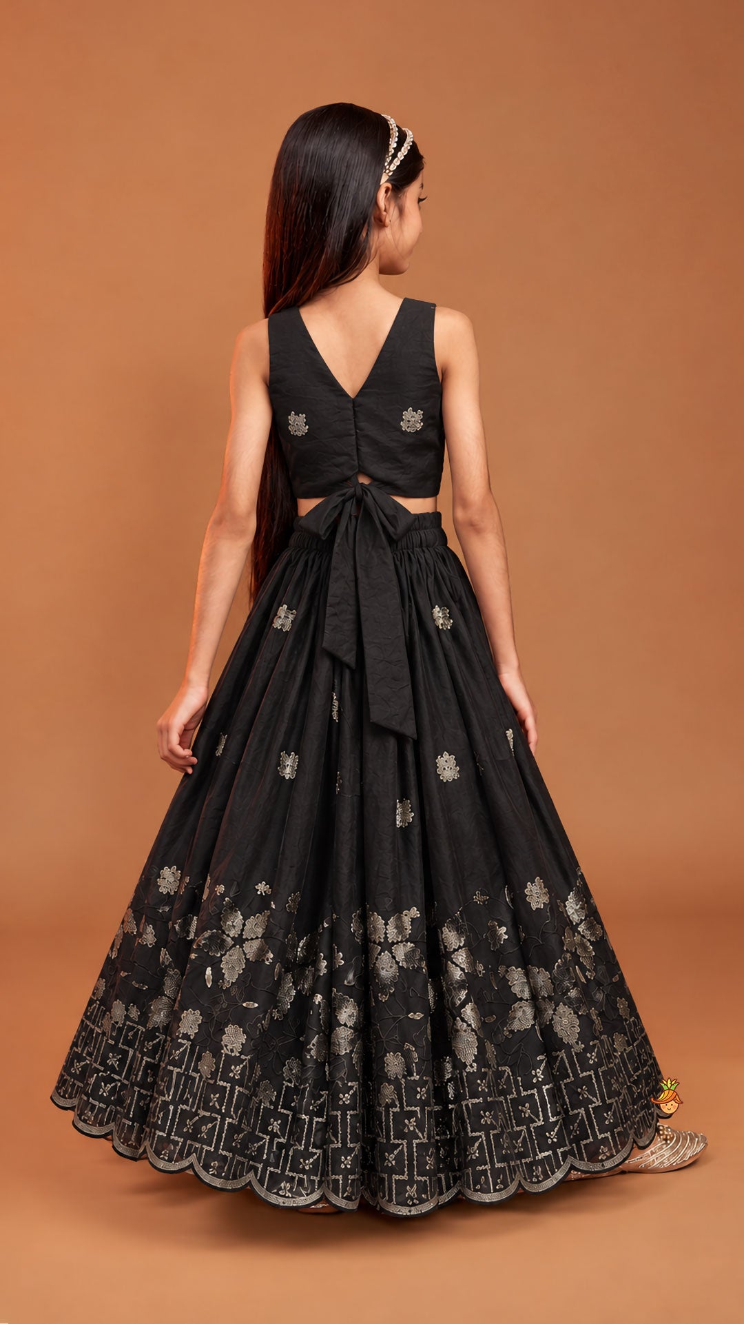 Exquisite Organza Top And Lehenga With Tassel Detailing