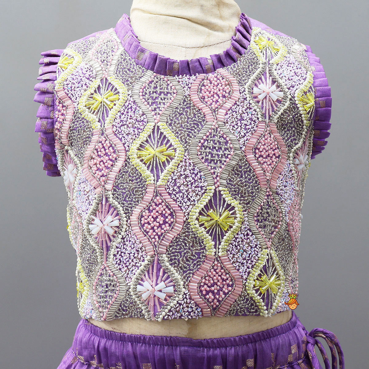 Trendy Open-Back Crop Top And Layered Lehenga