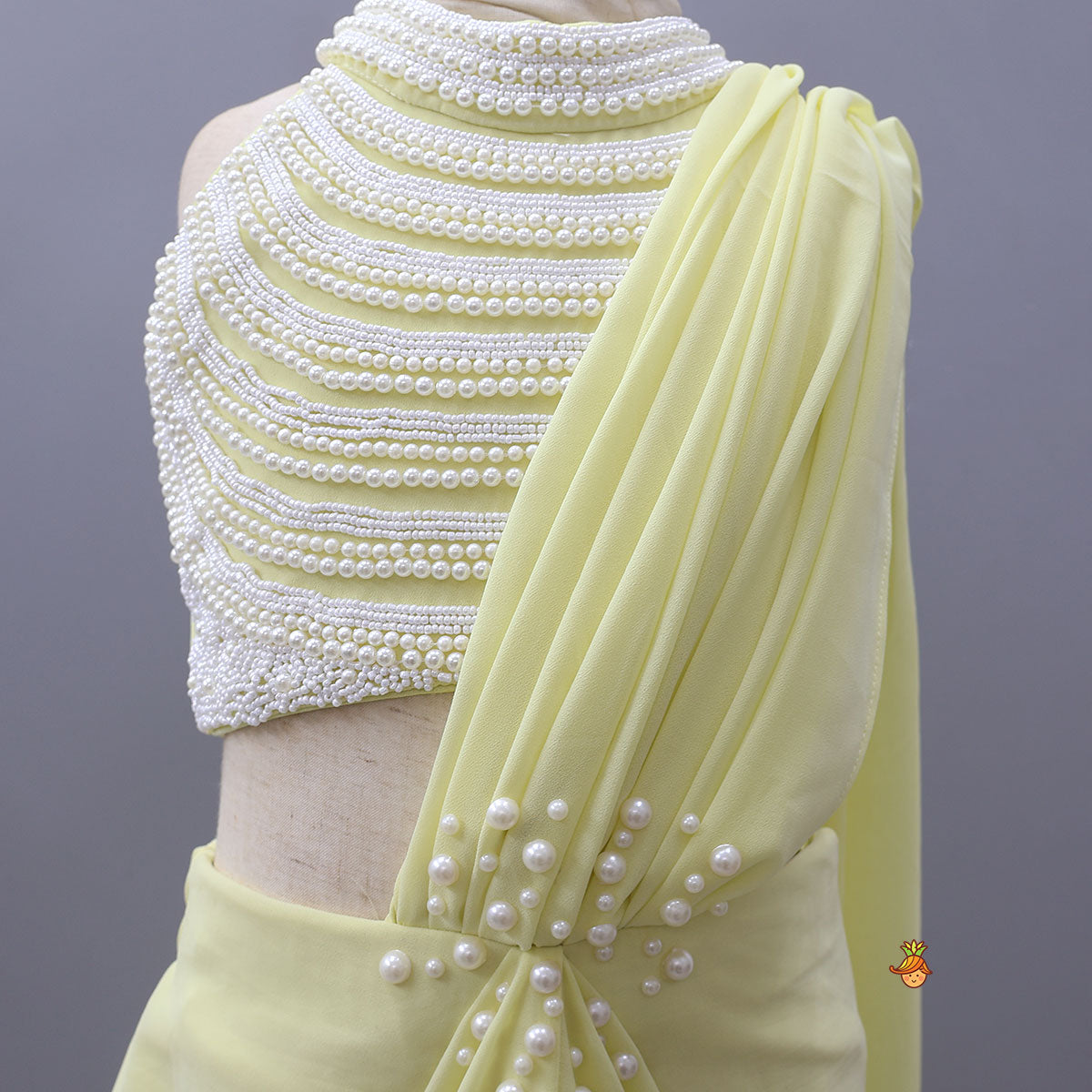 Graceful Faux Pearl Embellished Pre Draped Saree