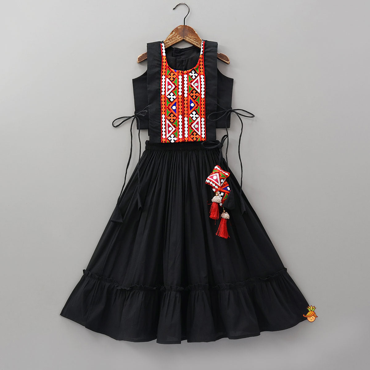 Top With Embroidered Overlay Cape And Tassel Detailed Flared Lehenga