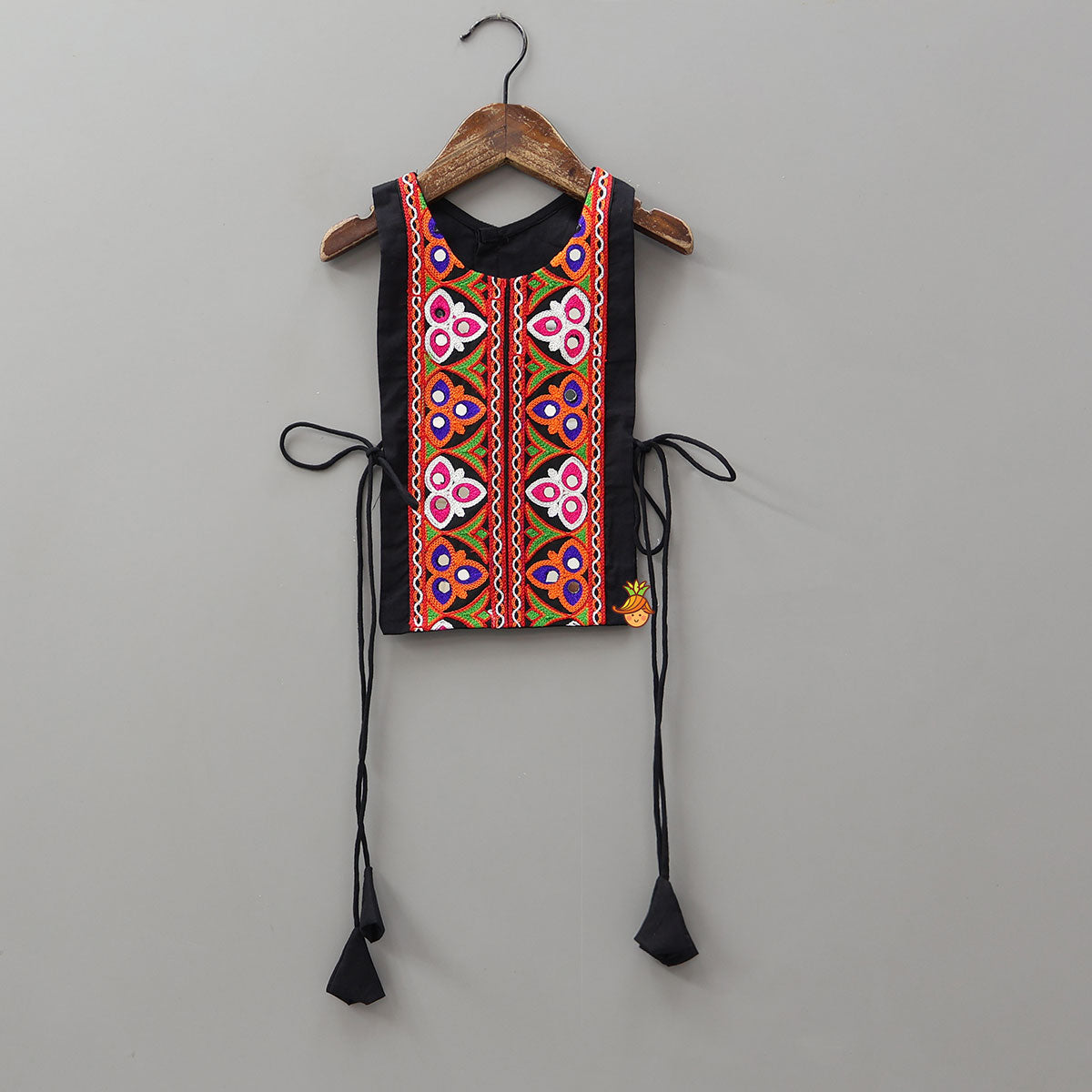 Top With Embroidered Overlay Cape And Tassel Detailed Flared Lehenga