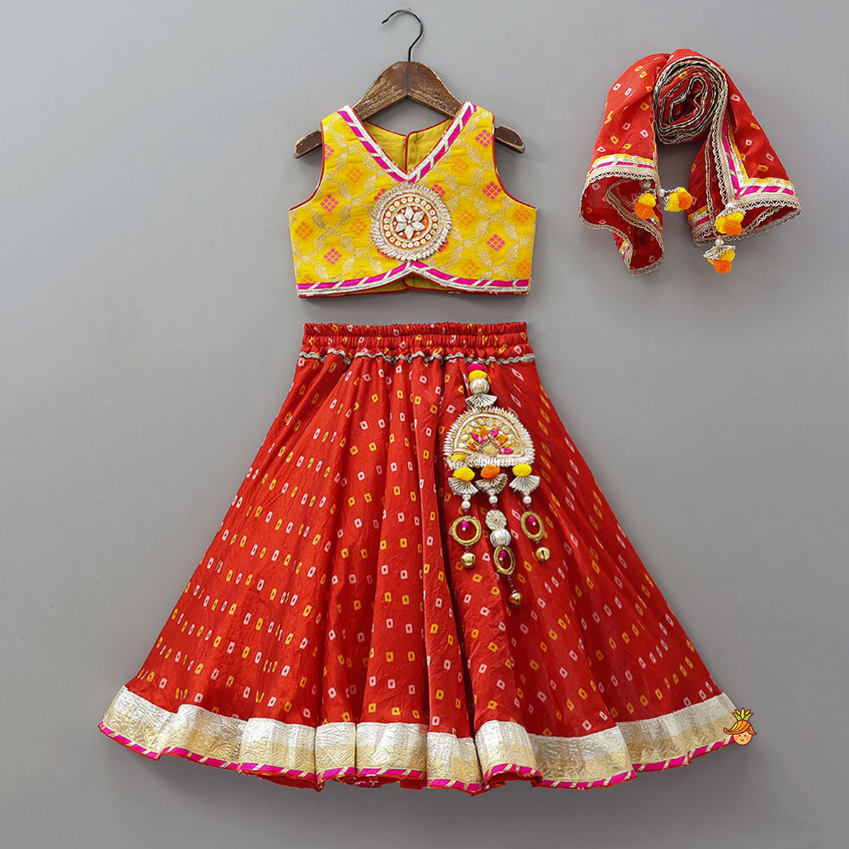 Stunning Crop Top And Tassel Detailed Bandhani Printed Sheen Lehenga With Dupatta