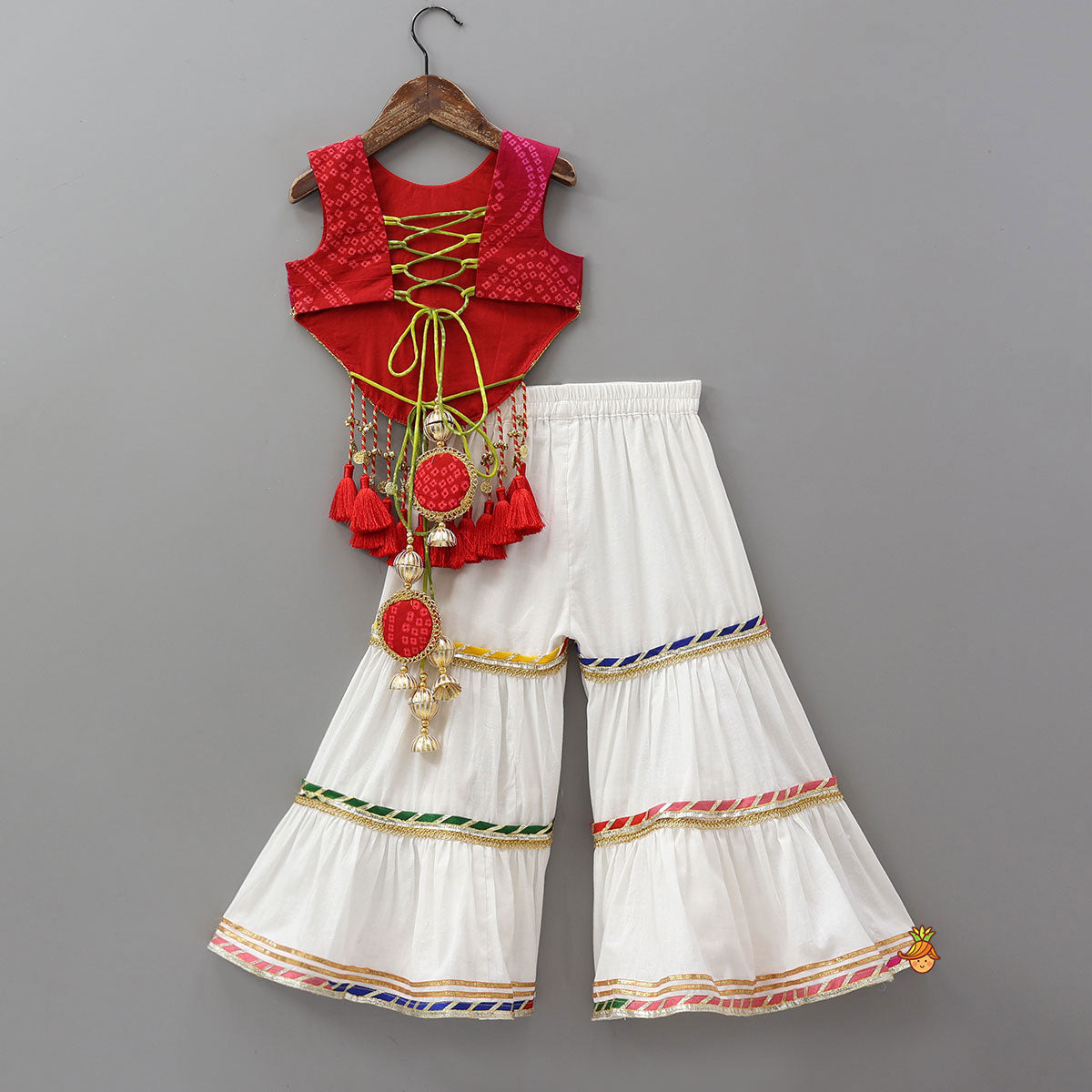 Curved Hem Bandhani Printed Top And Tiered Sharara With Bandhana