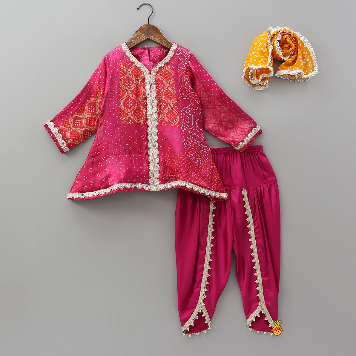 Festive Bandhani Printed Kurti And Dhoti Style Pant With Contrasting Dupatta