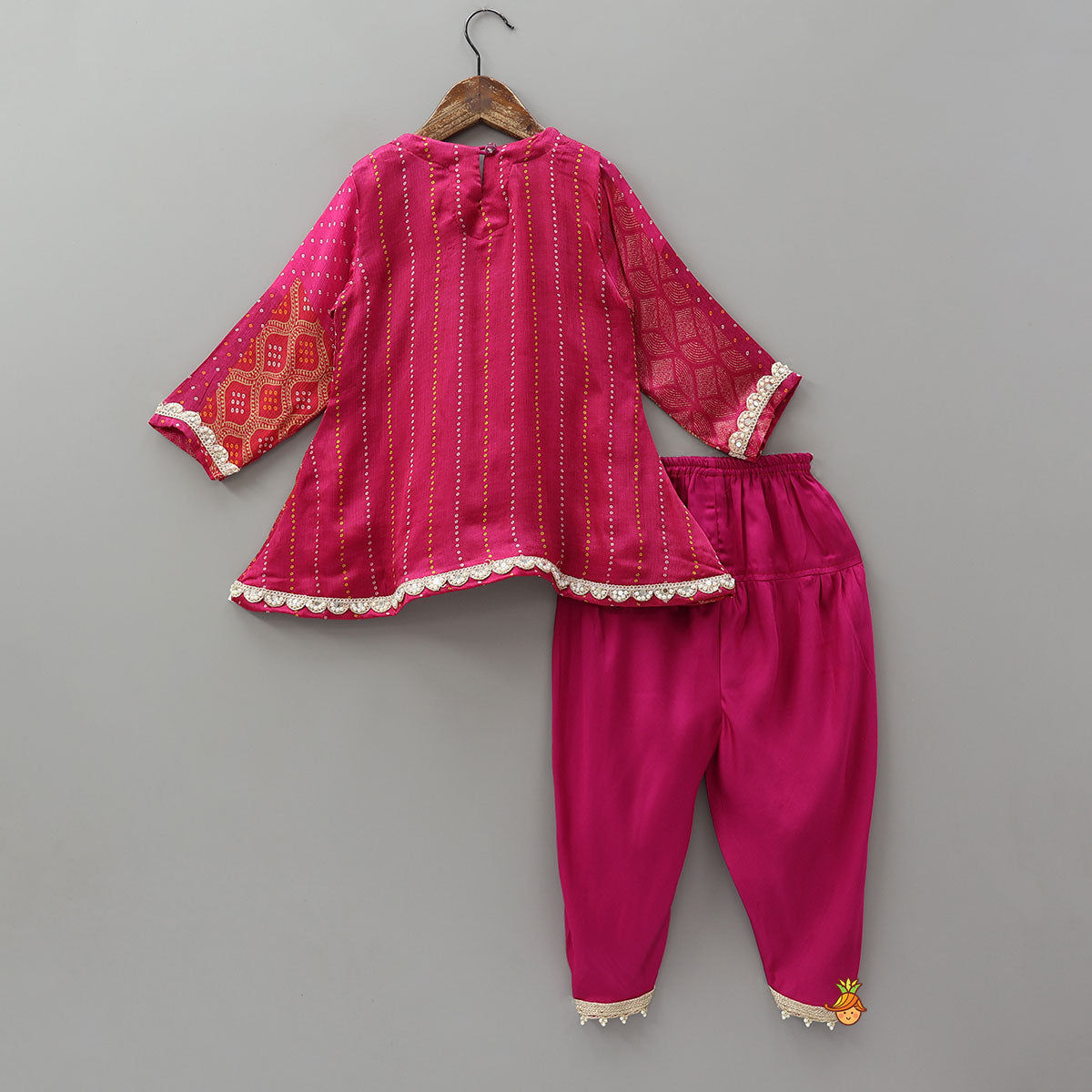 Festive Bandhani Printed Kurti And Dhoti Style Pant With Contrasting Dupatta