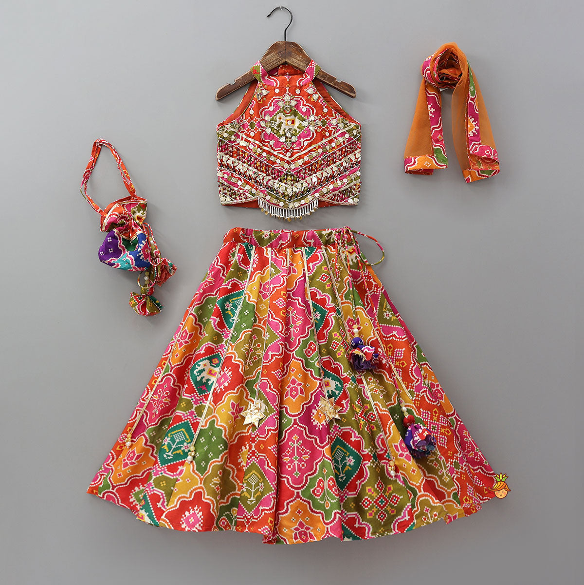 Halter Neck Heavily Embroidered Top And Lehenga With Dupatta And Potli Bag