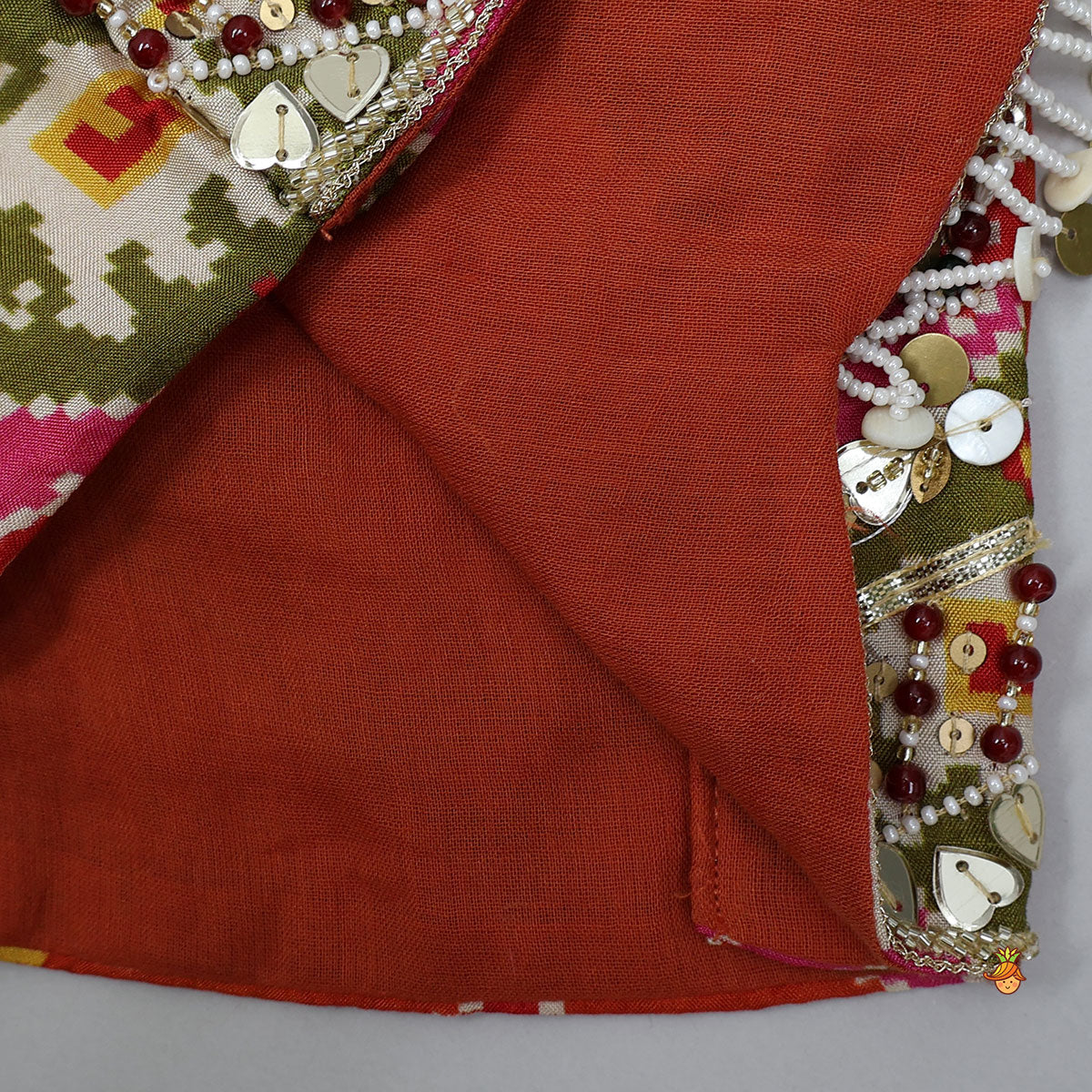 Halter Neck Heavily Embroidered Top And Lehenga With Dupatta And Potli Bag