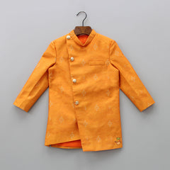 Pre Order: Orange Ikkat Printed Asymmetric Achkan And Pant
