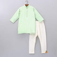 Pre Order: Green Kurta With Lotus Embroidered Open Jacket And Off White Churidar