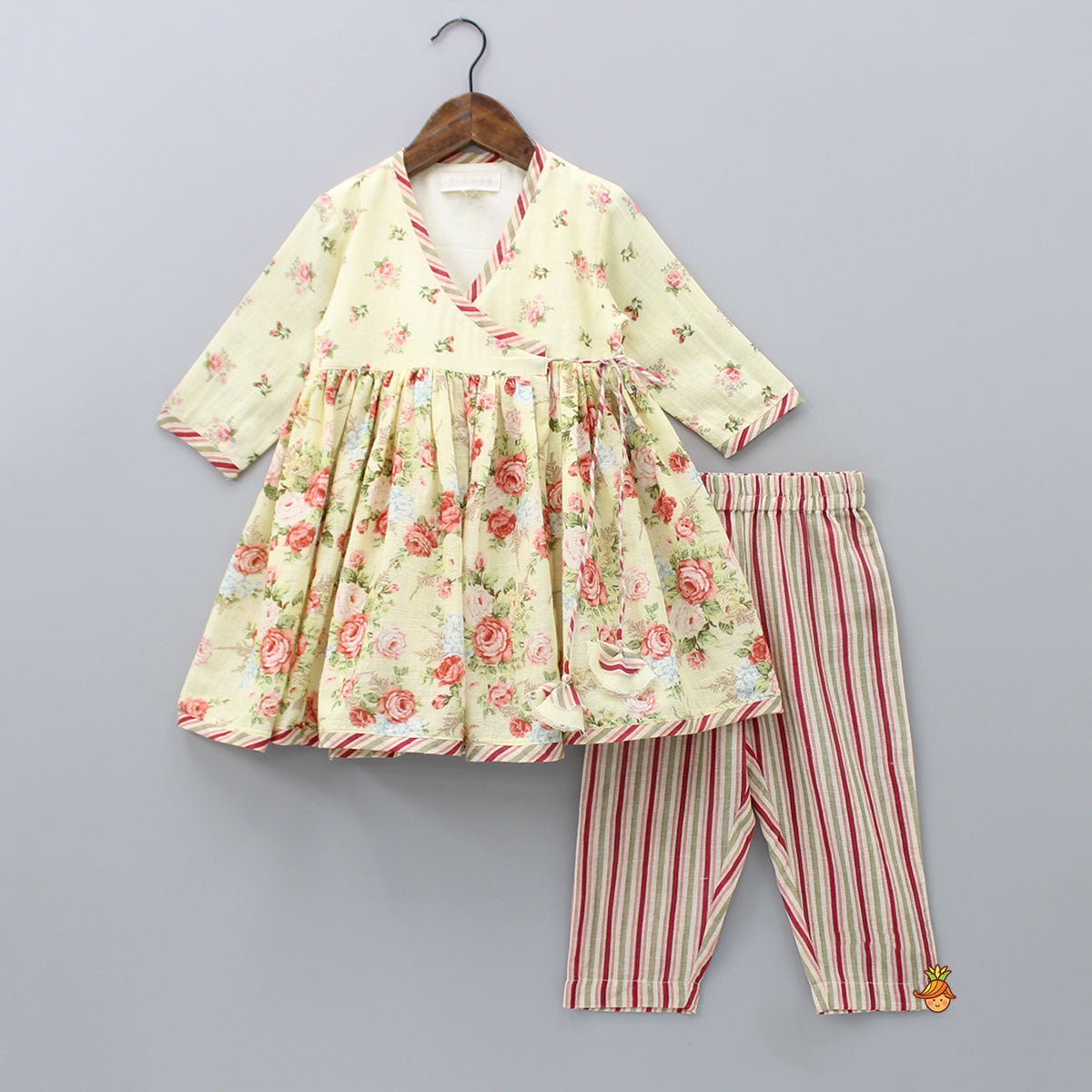 Pre Order: Floral Printed Yellow Angrakha Kurti With Striped Pant