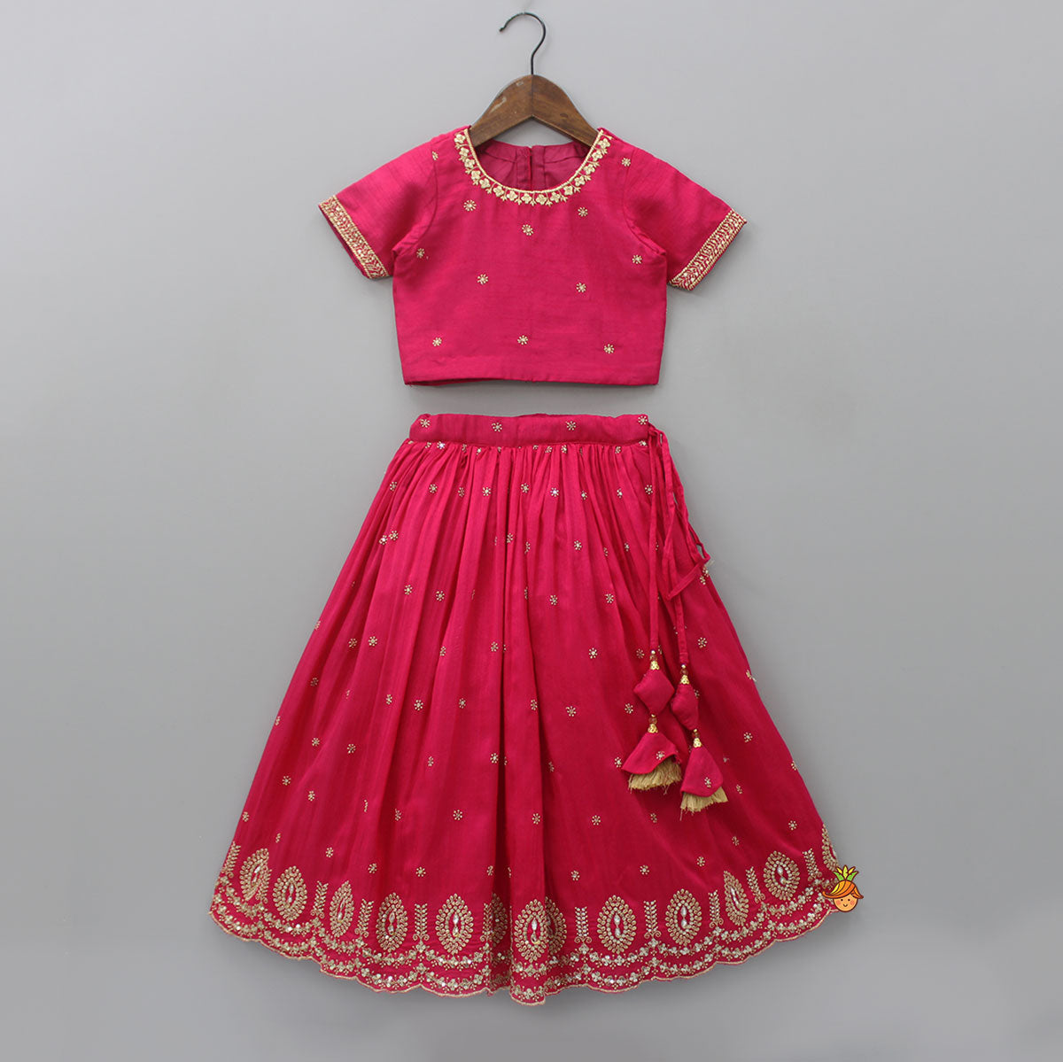 Pre Order: Booti Embroidered Silk Pink Top And Matching Tassels Enhanced Lehenga