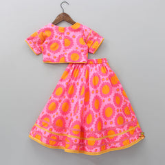 Pre Order: Cut Out Hem Dual Shaded Pink Top And Lehenga With Pom Pom Lace Detail Net Dupatta