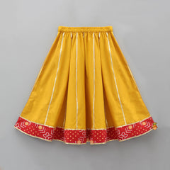 Pre Order: Bandhani Printed Red Angrakha Style Top With Lehenga And Matching Booties With Head Band