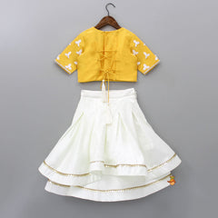 Pre Order: Beautiful Fabric Flowers Embroidered Top With Layered Lehenga And Dupatta