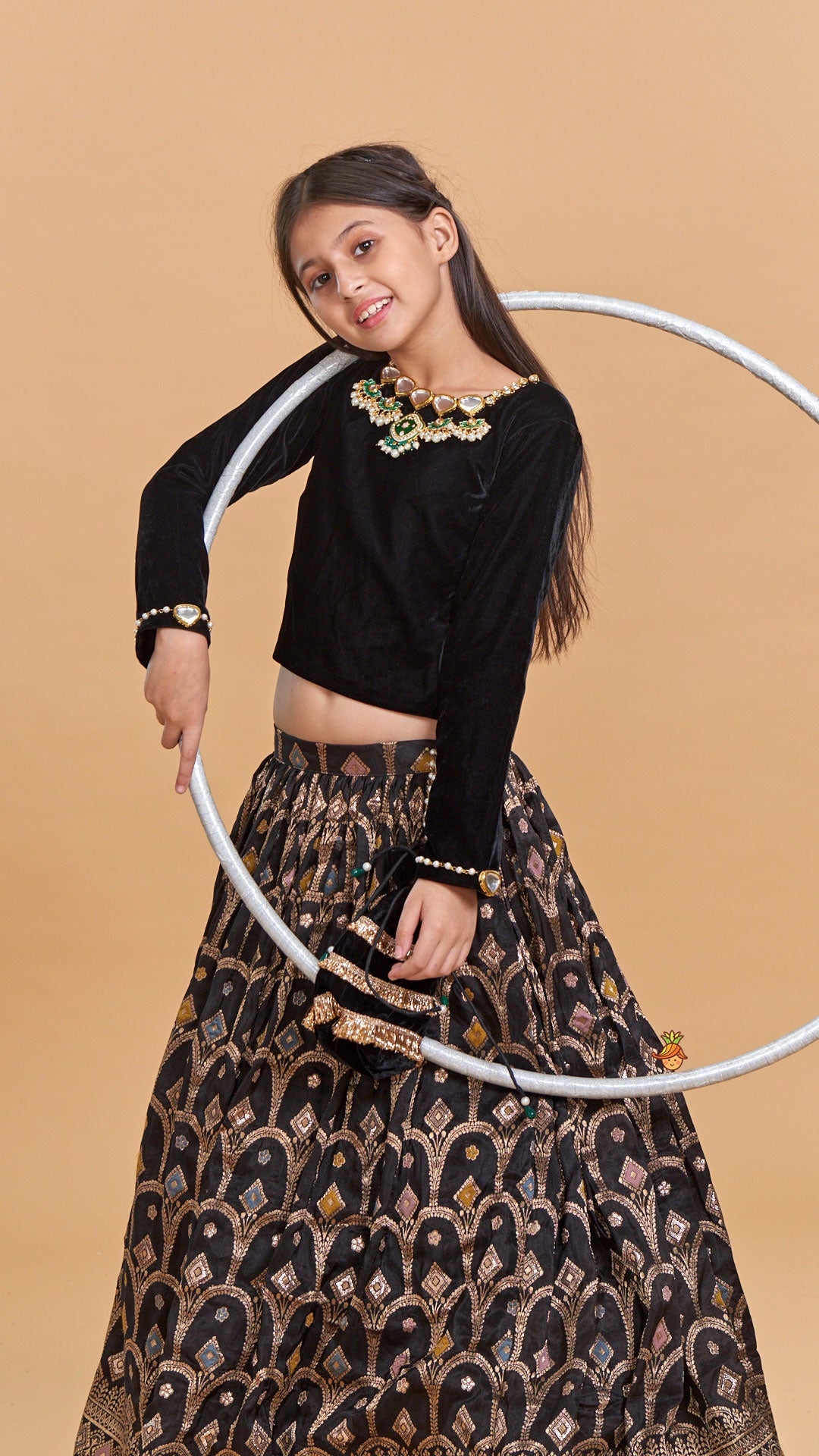 Stone Studded Black Velvet Top And Brocade Embroidered Lehenga With Shimmery Fringes Dupatta And Potli Bag