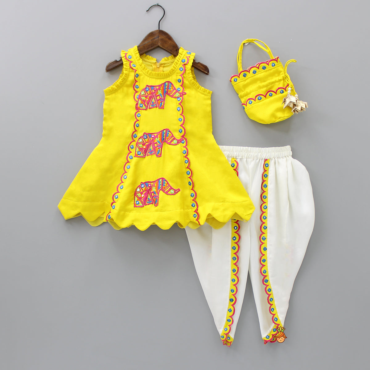 Pre Order: Scalloped Lace And Hem Detailed Yellow Kurti With Dhoti And Potli Bag