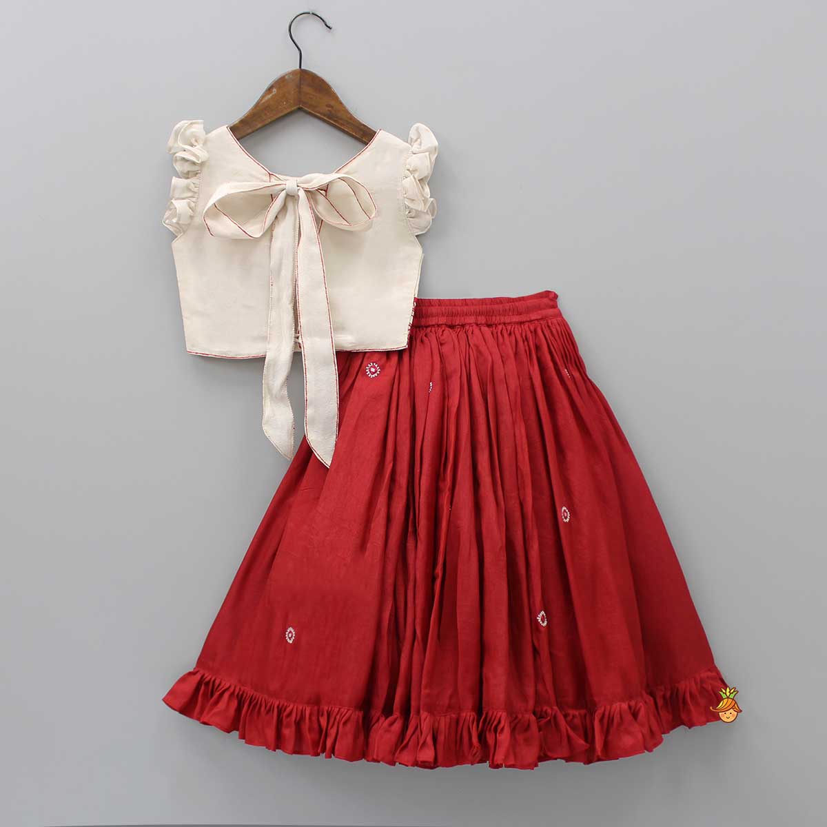 Back Knot Detail Beige Embroidered Top And Ruffle Hem Lehenga