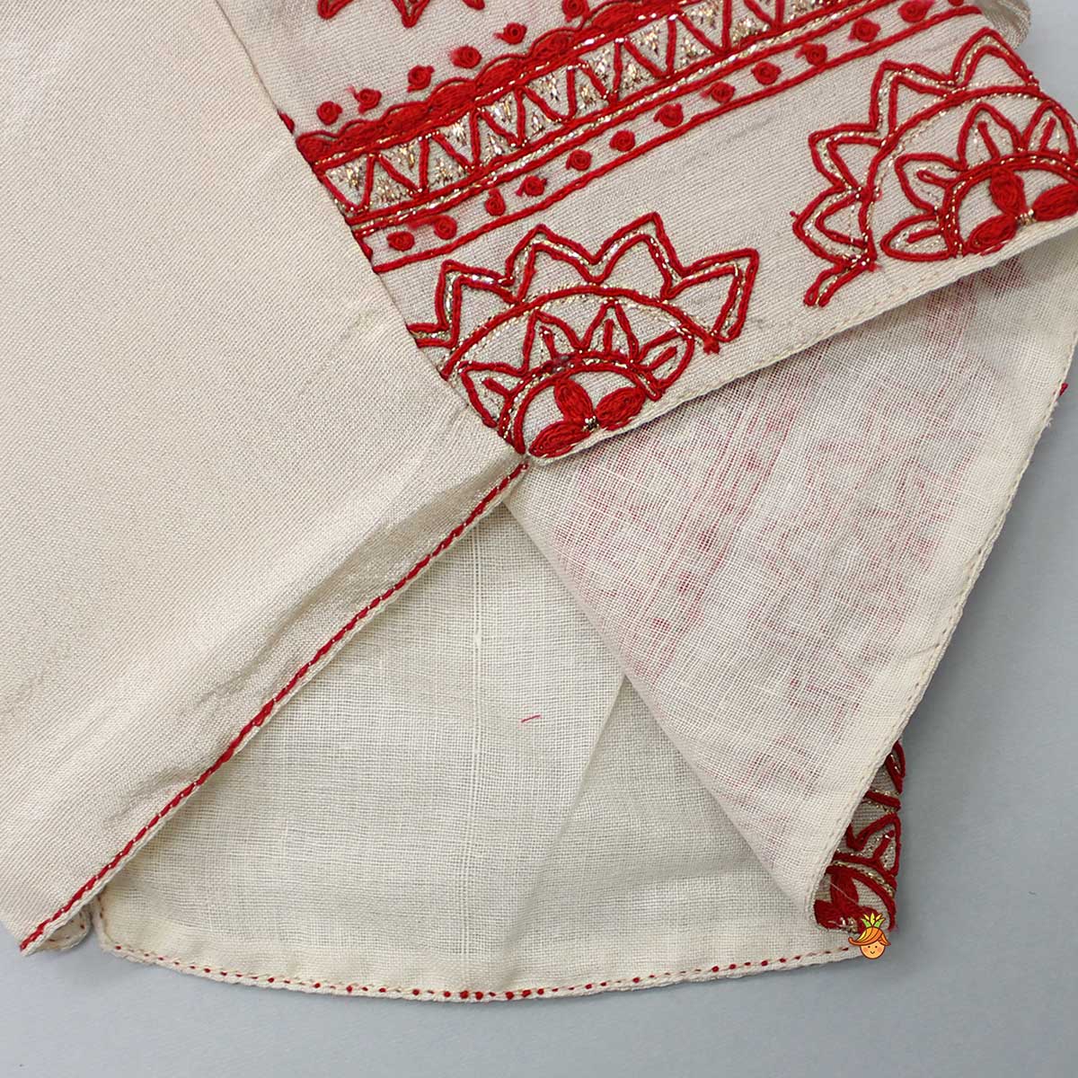Back Knot Detail Beige Embroidered Top And Ruffle Hem Lehenga