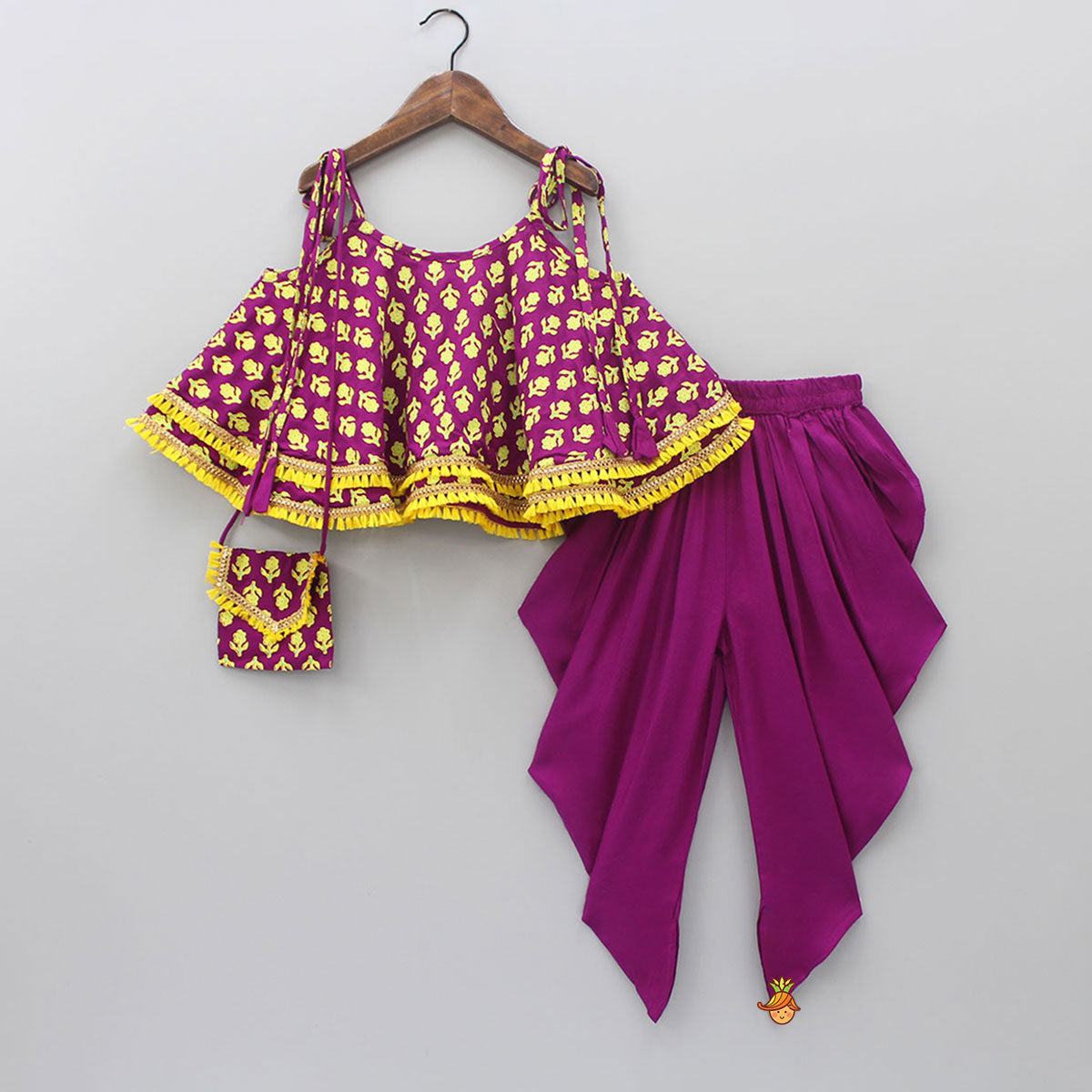 Magenta Stylish Printed Lace Work Top And Dhoti With Matching Sling Bag