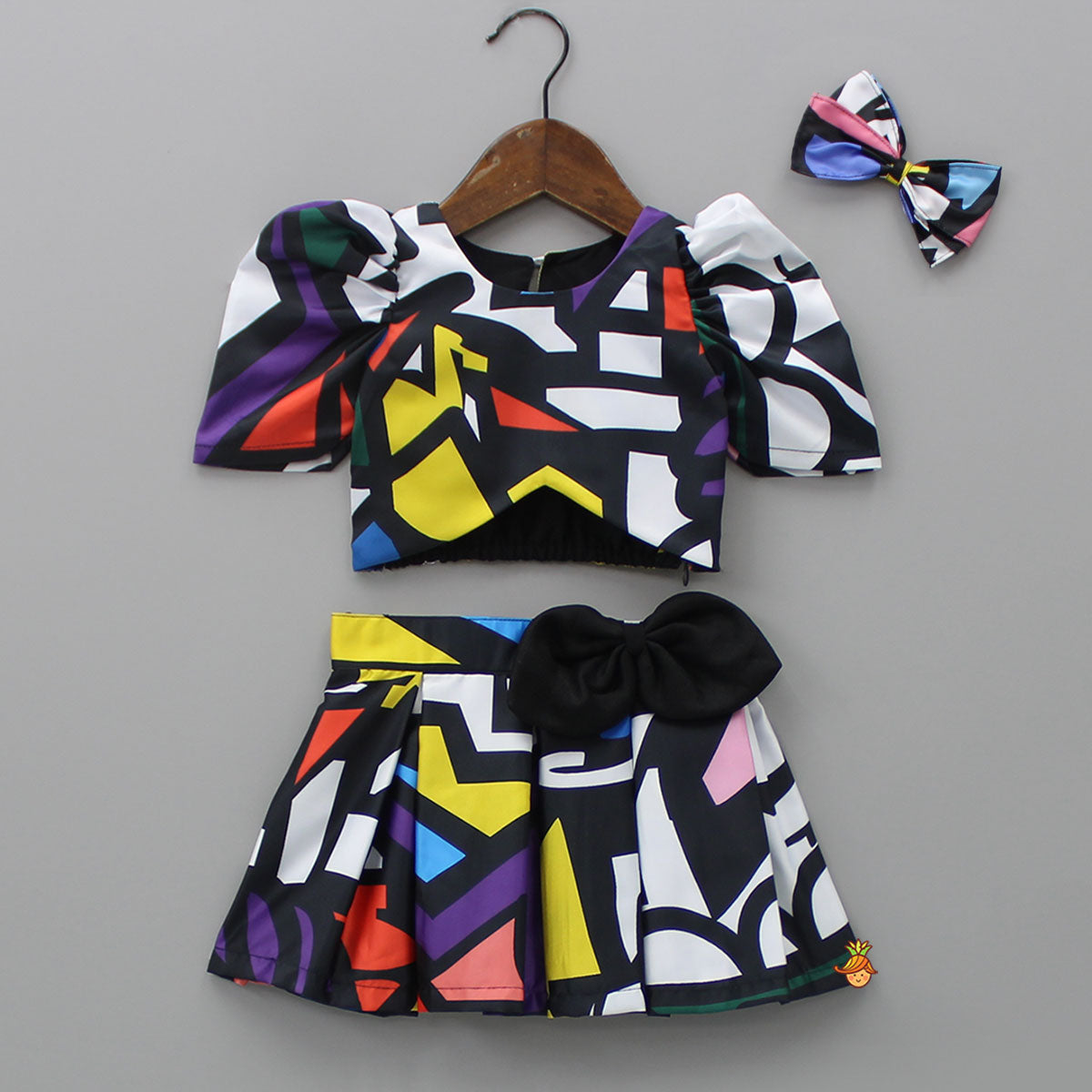 Geometric Printed Asymmetric Black Top And Skirt With Matching Hair Clip