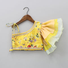 Pre Order: Blooming Flowers Printed One Shoulder Yellow Top With Colour Block Lehenga And Net Dupatta
