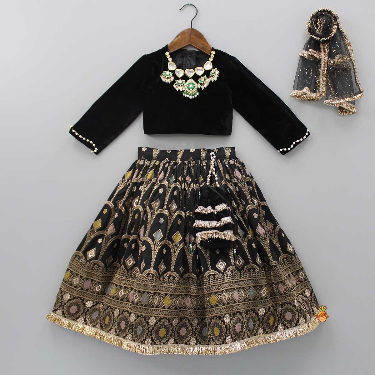 Pre Order: Stone Studded Black Velvet Top And Brocade Embroidered Lehenga With Shimmery Fringes Dupatta And Potli Bag