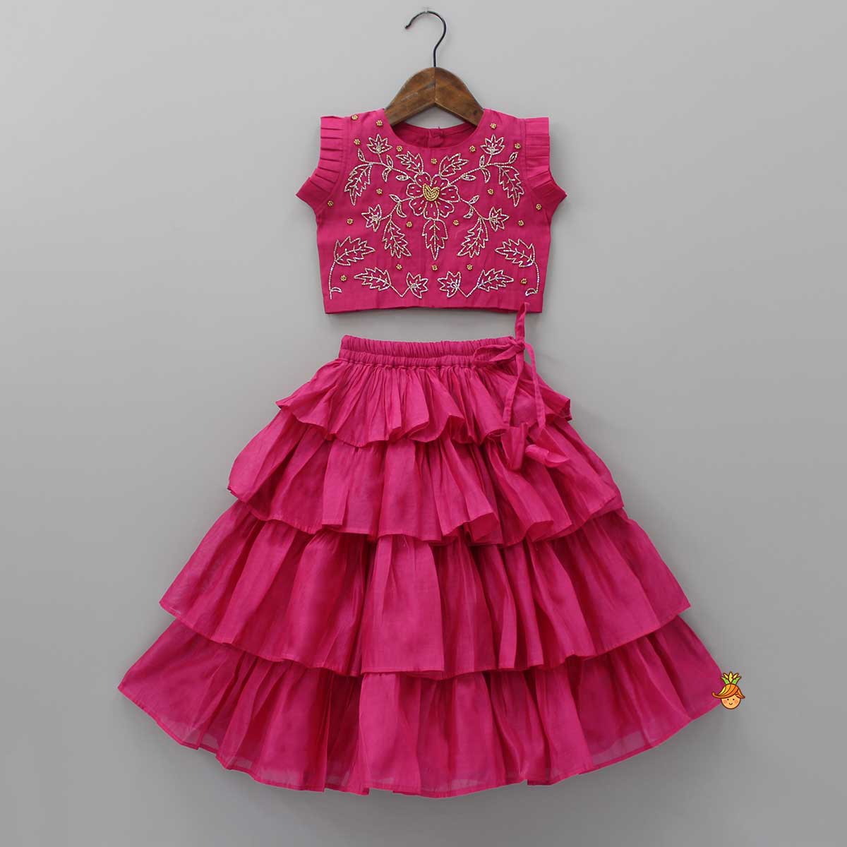 Pre Order: Charming Floral Cut Dana Embroidered Rani Pink Top And Multi Layered Ruffle Lehenga