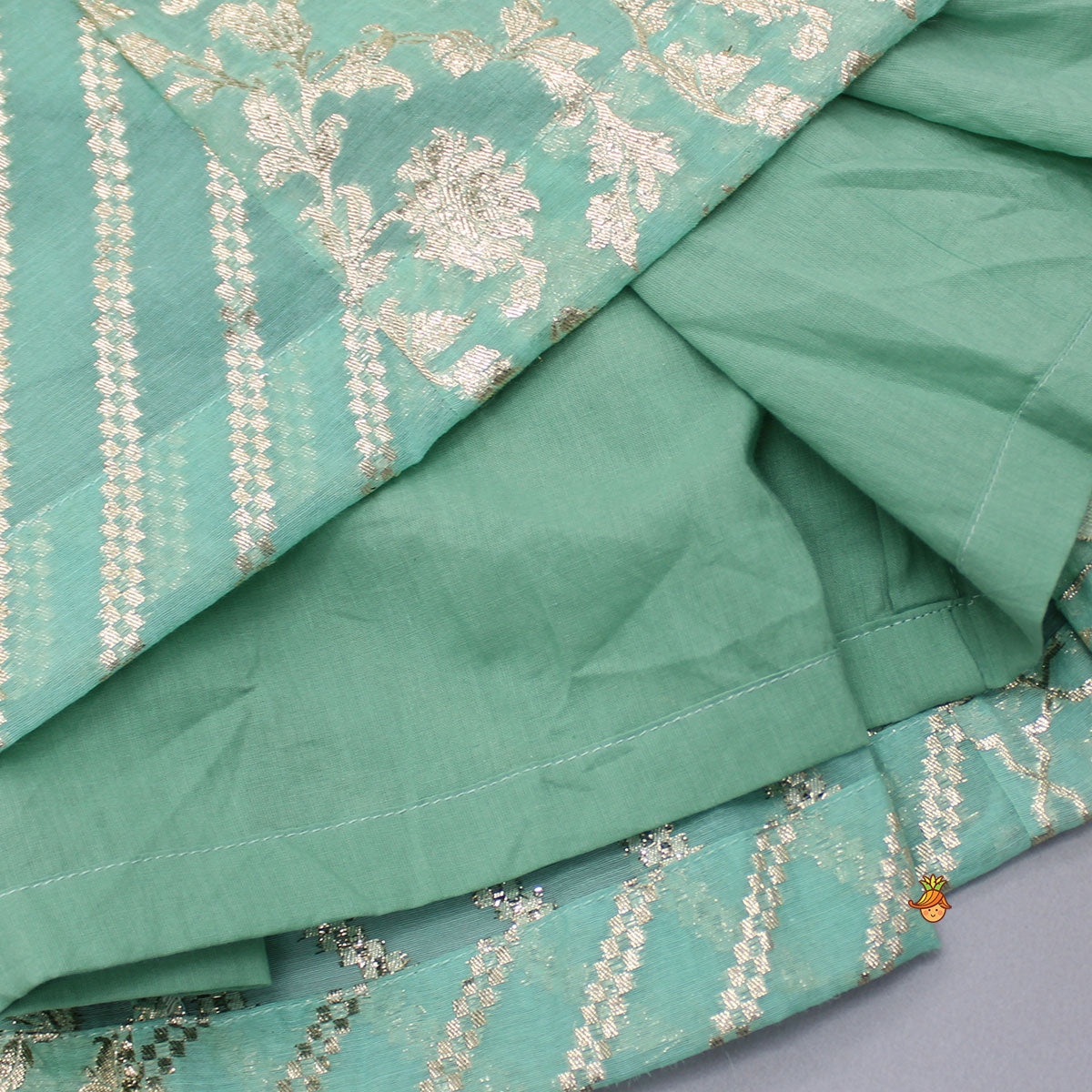 Organza Triple Layered Flap Mint Green Top And Zari Embroidered Lehenga