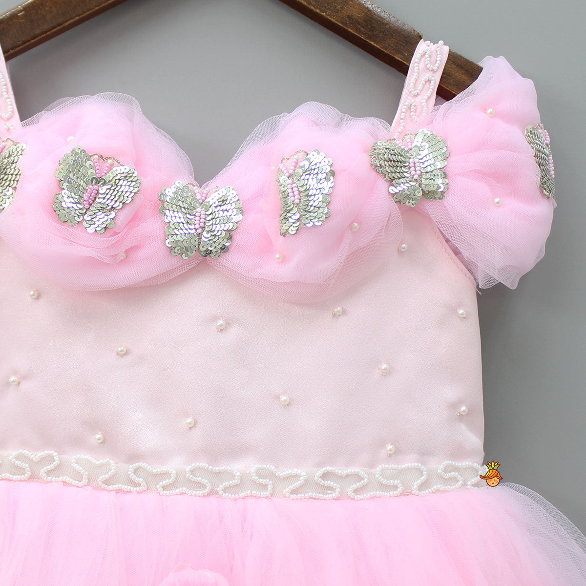 Butterfly And Pearls Enhanced Yoke Floral Baby Pink Gown With Detachable Drape Bow