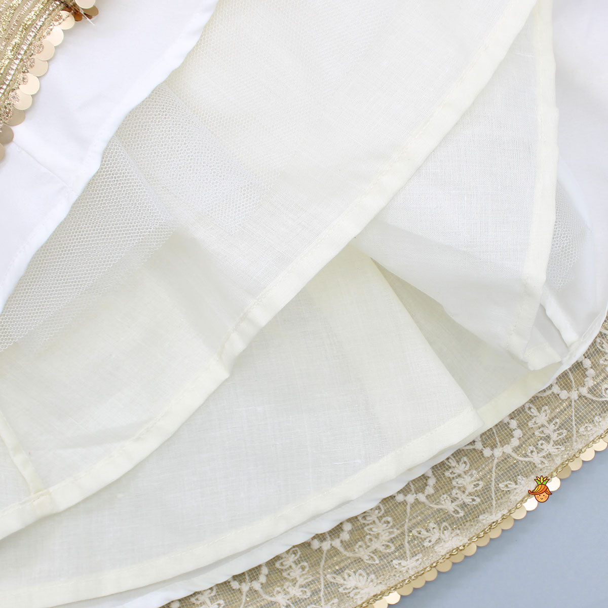 Round Neck Off White Top And Shimmer Tassels Enhanced Lehenga With Organza Dupatta
